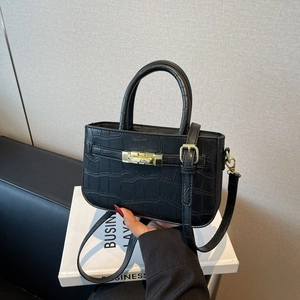 Classic black faux crocodile leather handbag with elegant gold hardware for women