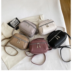 Litchi pattern leather shoulder bags in multiple colors with double zipper detail