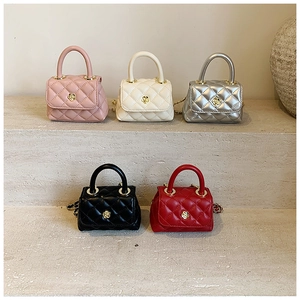 Mini quilted chain bags in pink, white, silver, black and red with gold flower charms