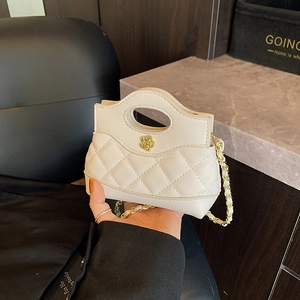 Elegant beige quilted mini bag with golden rose metal clasp and chain strap