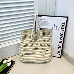 Handmade crochet striped tote bag with leather straps for beach and summer vacations