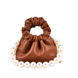 French style caramel pleated cloud bag with elegant large pearl handle strap design