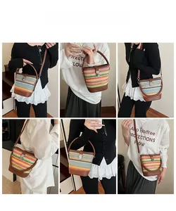Detail shots of colorful woven bucket bag with leather strap and silver metal hardware