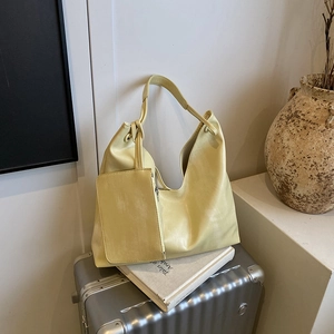 Minimalist light yellow PU leather hobo tote bag with a matching small coin purse