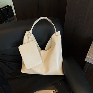 Minimalist cream white hobo bucket bag set with knotted shoulder strap and mini pouch