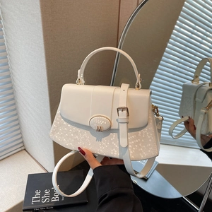 Chic white snake-embossed handbag with metallic M-logo buckle and shoulder strap