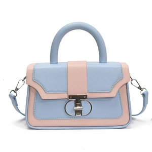 Minimalist two-tone light blue and pink handbag with elegant metal T-shaped buckle closure