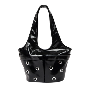 Glossy black underarm bag with silver metal eyelets and a punk style aesthetic