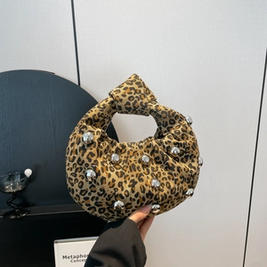 Chic leopard print underarm bag with silver rivets and knotted handle for women