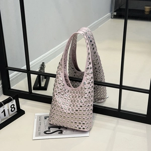 Pink rivet underarm bag with silver studs and minimalist stylish shoulder tote design