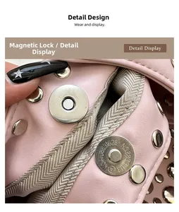 Close-up of pink leather bucket bag with magnetic snap closure and metal rivet detail