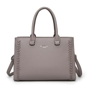 Retro taupe leather tote bag with braided accents and adjustable shoulder strap