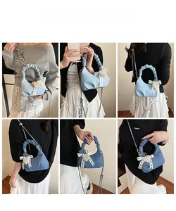Detail shots of denim cloud bag showing lace bows, pearl heart charm and chain strap