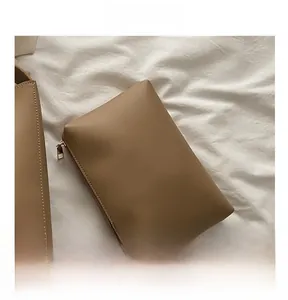 Khaki PU leather inner pouch with metal zipper for organized tote bag storage