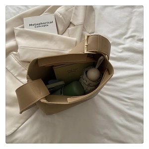 Internal view of large beige tote bag showing high capacity for daily essentials