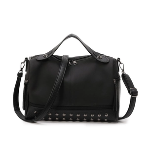 Black PU leather handbag with rivets and multi-zipper design for casual shoulder carry