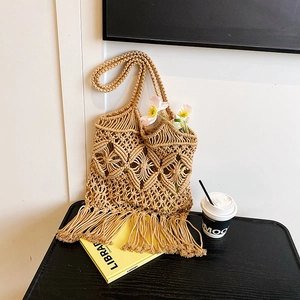 Sac cabas bohémien en macramé tissé ajouré avec franges pour les vacances d'été