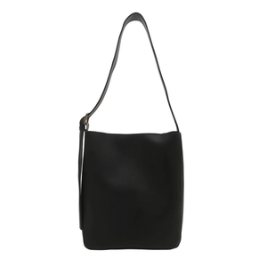 Minimalist black leather tote bag with adjustable shoulder strap and gold hardware