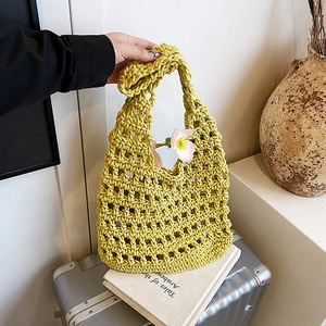 Bright lime green hand-knitted hollow tote bag with floral charm for summer beach vacation