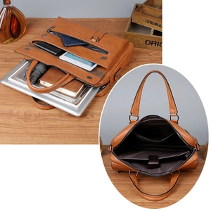 Detailed view of brown pebbled leather briefcase with organized compartments for laptop