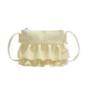 Chic cream yellow bucket bag with double-layered flounces and silver metal zipper details