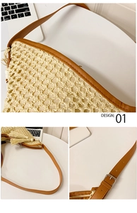 Detail view of woven shoulder bag with brown leather trim, tassel charm and strap buckle