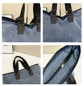 Detail view of denim tote bag showing leather reinforcement and zipper closure