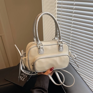 Minimalist cream white PU leather handbag with silver trim and detachable shoulder strap