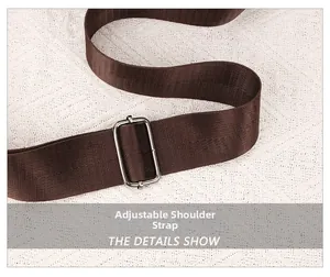 Detail of adjustable dark brown woven shoulder strap with silver square metal buckle