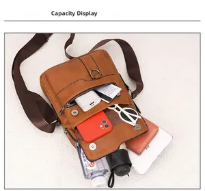 Top view showing the large capacity of a brown PU leather messenger bag with multiple pockets
