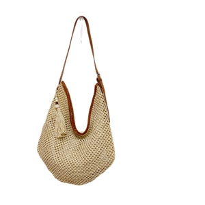 Bohemian large capacity woven tote bag with brown leather straps and tassel detail