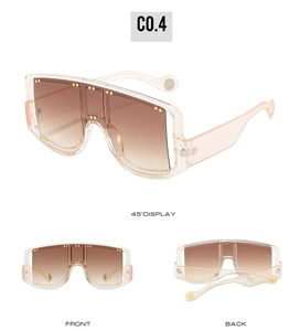 Detailed views of oversized rimless square sunglasses with gradient lenses and gold rivets