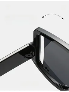 Macro shot of durable silver metal texture hinge and thick black frame sunglasses