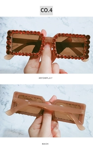 Detail display of square crystal sunglasses showing 45-degree angle and back view