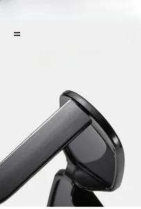 Detail view of glossy black sunglasses hinge showing premium lighter and super elastic material