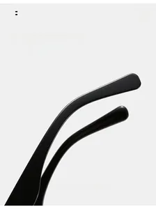 Detail of ergonomic curved black sunglass legs designed for comfortable wear and stability