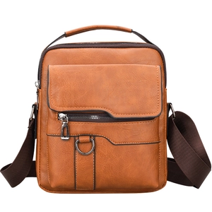 Brown PU leather crossbody bag with top handle and adjustable strap in business casual style