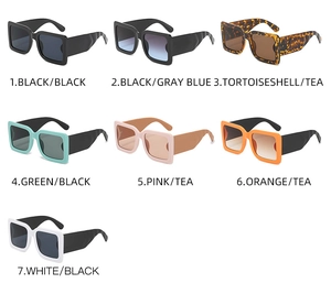 Flat lay of square sunglasses in seven colors including black, tortoise, and mint green