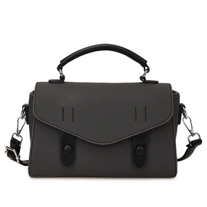 Gray canvas and black leather tote bag with silver hardware for office commute