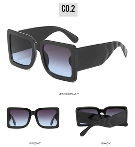 Detail view of black square sunglasses with blue purple gradient lenses and wavy temples