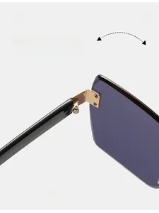 Nahaufnahme der goldenen Metallscharniere und lila Verlaufsgläser dieser Oversize-Sonnenbrille