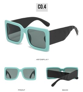 Detailed views of mint green square sunglasses with black temples showing 45-degree angle