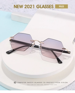 Detail of rimless geometric sunglasses with purple gradient lenses and gold metal frame