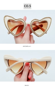 Detailed 45-degree and back view of heart-shaped sunglasses with double-row rhinestones