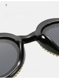 Close-up of comfortable nose pads on heart-shaped sunglasses with rhinestone details