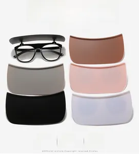 Flat lay of flip-up sunglasses set featuring five interchangeable multi-color lens plates