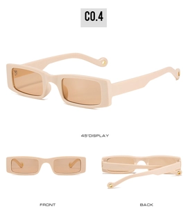 Creamy beige rectangle sunglasses featuring light brown lenses and gold circular temple tips