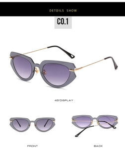 Cat eye sunglasses detail with grey geometric frame, purple gradient lenses and gold temples