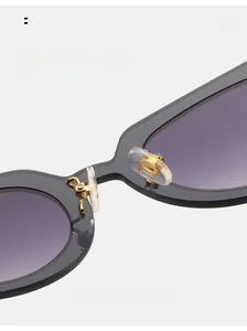Detail showing comfortable silicone nose pads and durable gold metal supports of sunglasses
