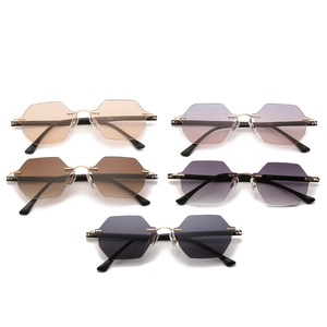 Five pairs of trendy rimless geometric sunglasses in various colors with gold metal temples